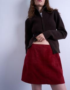 Model wearing Co-ord real suede mini skirt in burgundy