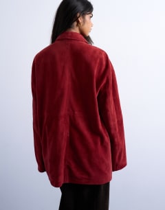 Model wearing Co-ord real suede shirt in burgundy