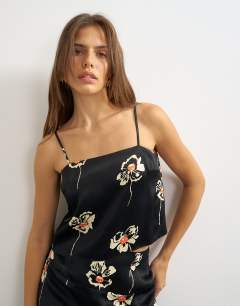 Model wearing Co-ord satin cami in floral print