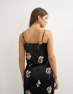 Model wearing Co-ord satin cami in floral print