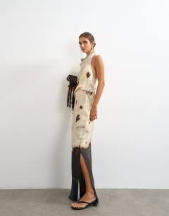 Model wearing Co-ord satin cowl halter top in abstract print
