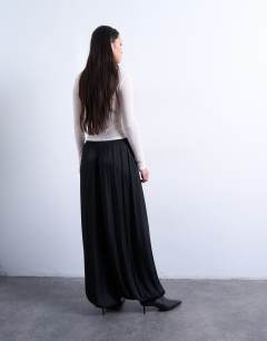 Model wearing Co ord satin deep waistband balloon trouser in black