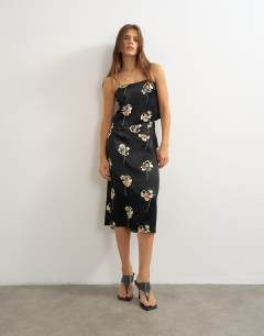 Model wearing Co-ord satin midi skirt in floral print