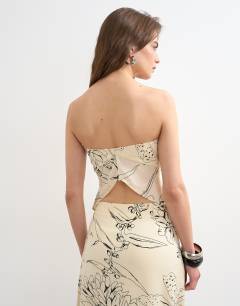 Model wearing Co-ord scarf bandeau top in mono sketched floral