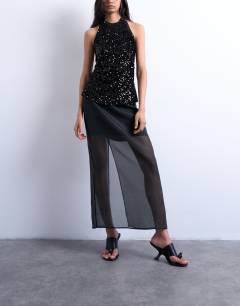 Model wearing Co-ord sheer organza maxi skirt in black