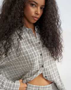 Model wearing Co ord shirt in mono check