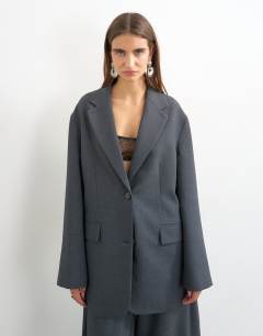 Model wearing Co ord slouchy chuck on blazer in grey