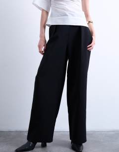Model wearing Co ord slouchy clean waist band tailored trouser in black 