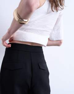 Model wearing Co ord slouchy clean waist band tailored trouser in black 