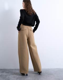 Model wearing Co ord slouchy clean waist band tailored trouser in taupe