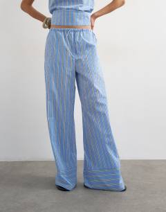 Model wearing Co ord straight leg trouser in blue stripe