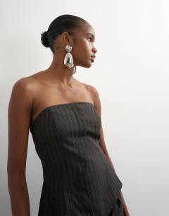 Model wearing Co ord stripe asymmetric seamed bandeau in brown