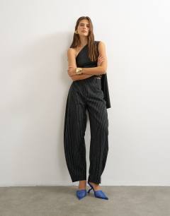 Model wearing Co ord stripe tailored pleat detail low rise trouser in black