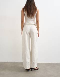 Model wearing Co ord striped barrel trouser in white
