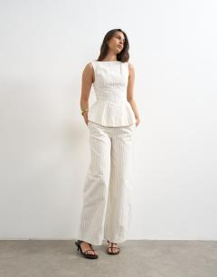 Model wearing Co ord striped high neck top in white