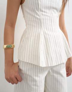 Model wearing Co ord striped high neck top in white