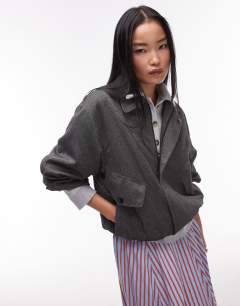 Model wearing Co ord tailored bomber style jacket in charcoal