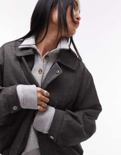 Model wearing Co ord tailored bomber style jacket in charcoal