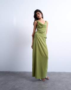 Model wearing Co-ord twist shoulder velvet cami in avocado