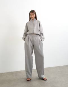 Model wearing Co ord twisted seam slim trouser in grey 