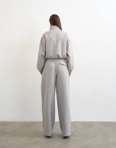 Model wearing Co ord twisted seam slim trouser in grey 