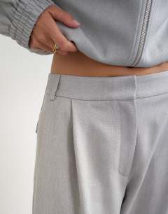 Model wearing Co ord twisted seam slim trouser in grey 