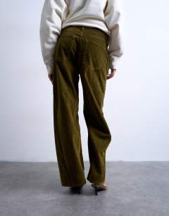Model wearing Co ord velvet barrel leg seam detail trouser in khaki