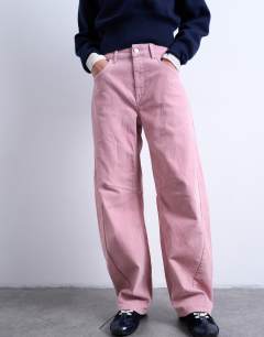 Model wearing Co ord velvet barrel leg seam detail trouser in pink