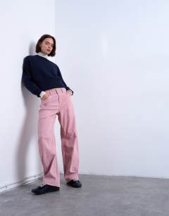Model wearing Co ord velvet barrel leg seam detail trouser in pink