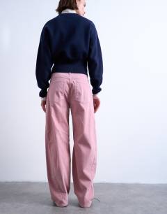 Model wearing Co ord velvet barrel leg seam detail trouser in pink