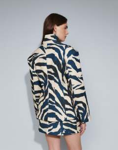 Model wearing Co-ord zebra print high neck blazer in zebra