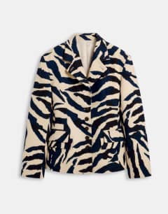 Model wearing Co-ord zebra print high neck blazer in zebra