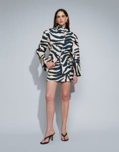 Model wearing Co-ord zebra tailored mini skirt in zebra