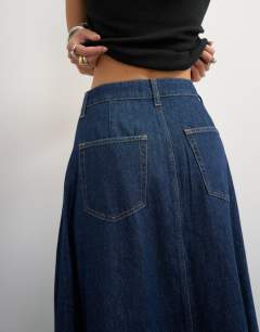 Model wearing Cocoon maxi skirt in rock blue