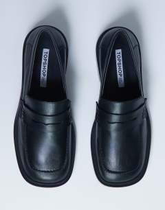 Model wearing Cole premium real leather square toe loafers in black