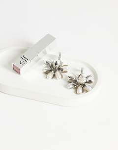 Model wearing Colette flower cluster drop earring in silver and pearl