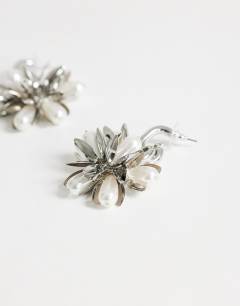 Model wearing Colette flower cluster drop earring in silver and pearl