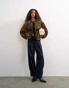 Collareless cord fleece jacket in animal print