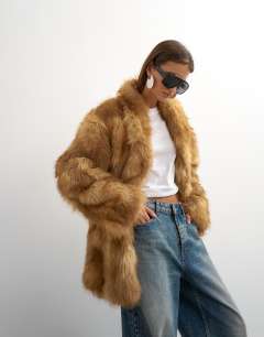 Model wearing Collarless mid length faux fur coat in multi