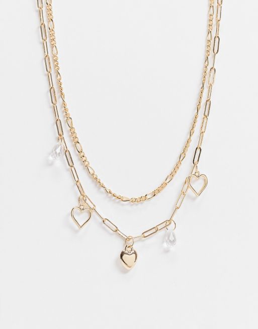 Topshop - Collier multi-rangs avec chaîne en maille serpentine et pendentifs cœurs - Doré