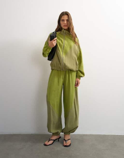 Topshop color block horseshoe pants and funnel neck track jacket set in green