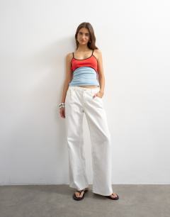 Model wearing Colour block cami fitted vest co-ord in red