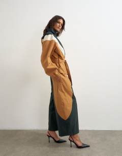 Model wearing Colour block horseshoe trouser in brown and black