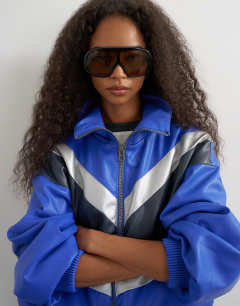 Model wearing Colour block leather look track jacket in blue