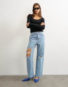 Column mid rise jean with extreme rip in bleach