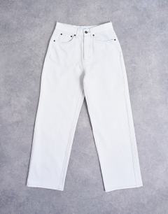 Model wearing Column mid rise jeans in bone