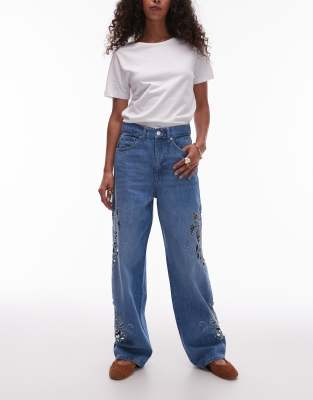 Column mid rise jeans with cutwork details in mid blue
