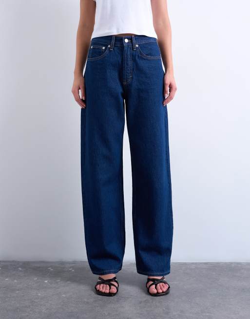 Topshop – Column – Tief sitzende Jeans in indigoblauer Rinse-Waschung mit mittelhohem Bund