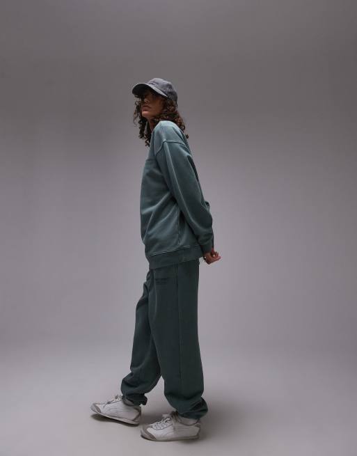 Topshop - Community - Coordinato verde con felpa oversize con grafica
