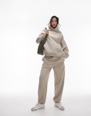 Topshop - Community - Jogginghose in Steinbeige mit Bündchen und Grafik, Kombiteil-Neutral